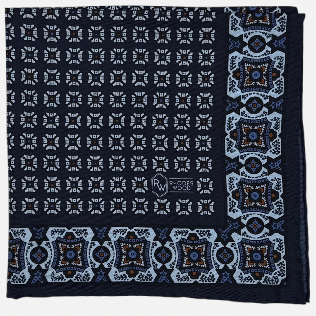 Navy Blue silk pocket square with sky blue
Mosaics repeating across the silk.