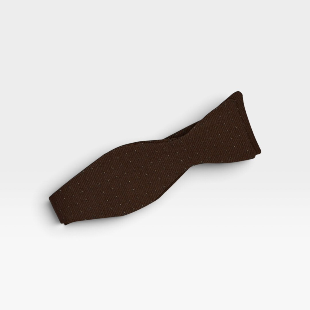 A self tie bow tie in a brown medallion design