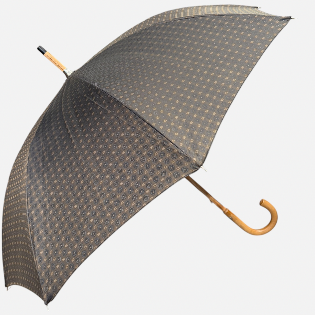 A brown Motif umbrella with a malacca handle 