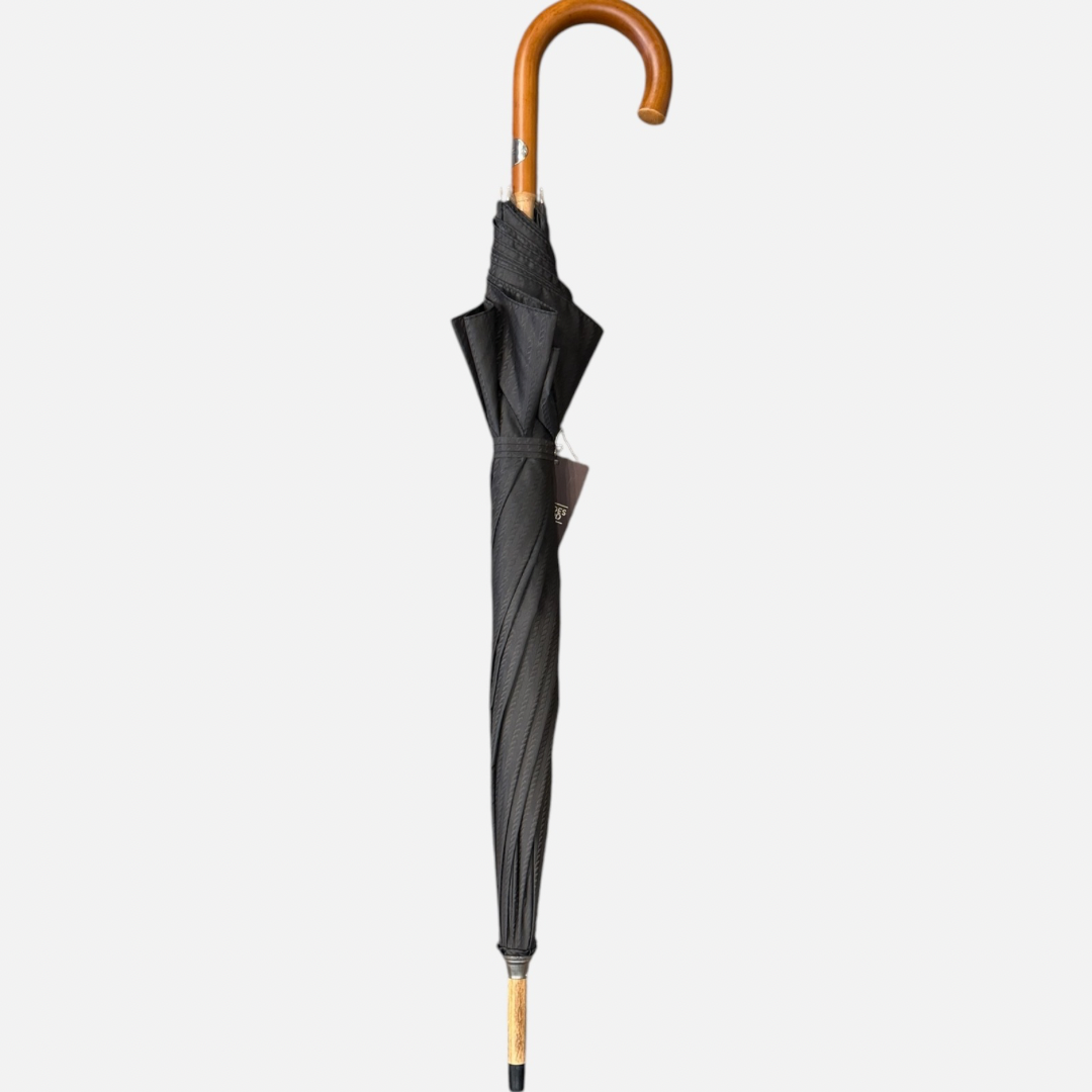 A brown rope umbrella On a malacca handle 