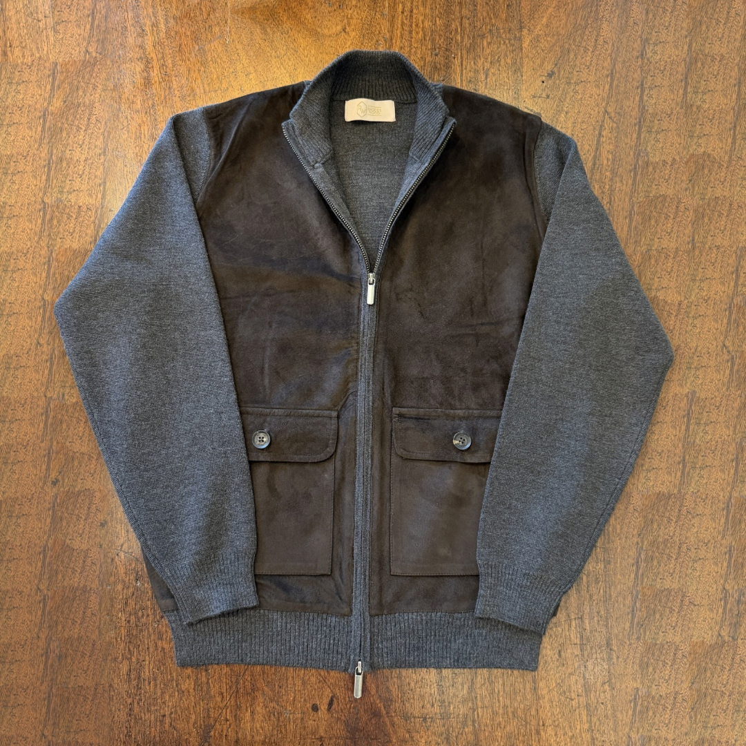 A Brown Suede front cardigan with Grey knitted arms and back in Italian merino
Wool. 