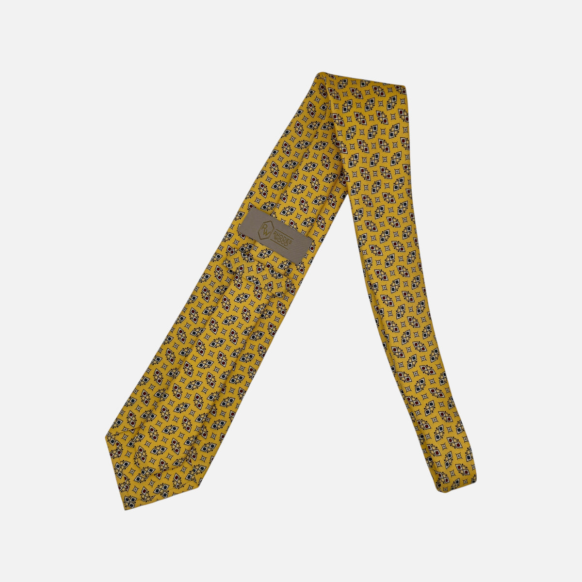 A yellow necktie with Geometric patterns.