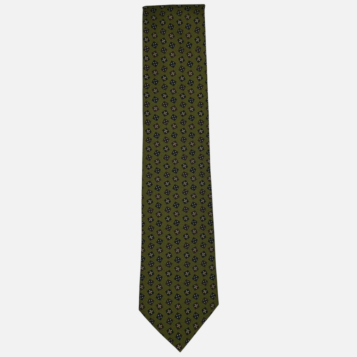 A moss coloured tie with medallions across the silk.