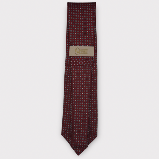 Classic silk necktie, printed in England, with a 9cm blade and 150cm length, laid flat against a plain background