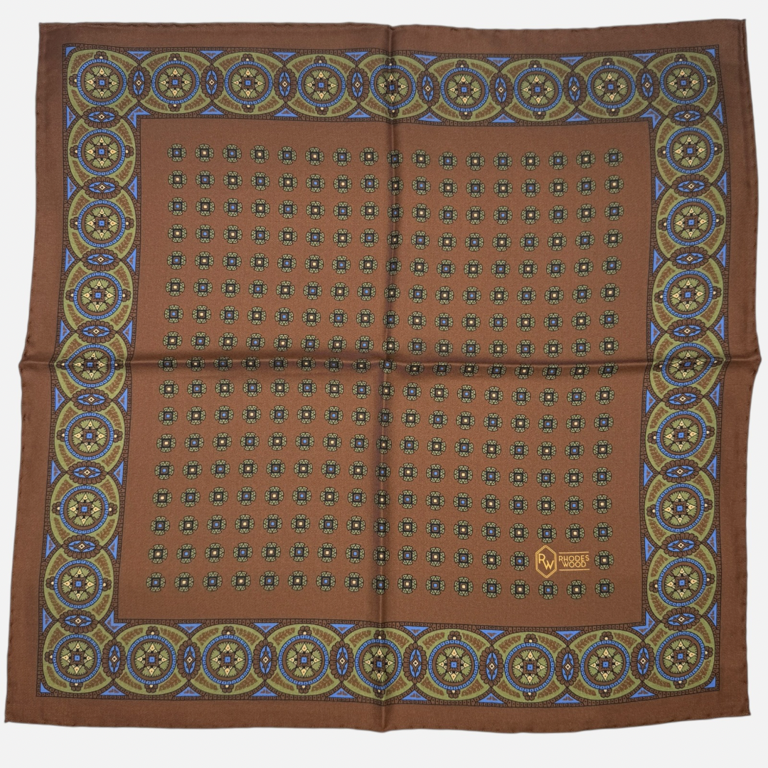 A brown medallion pocket Square. 