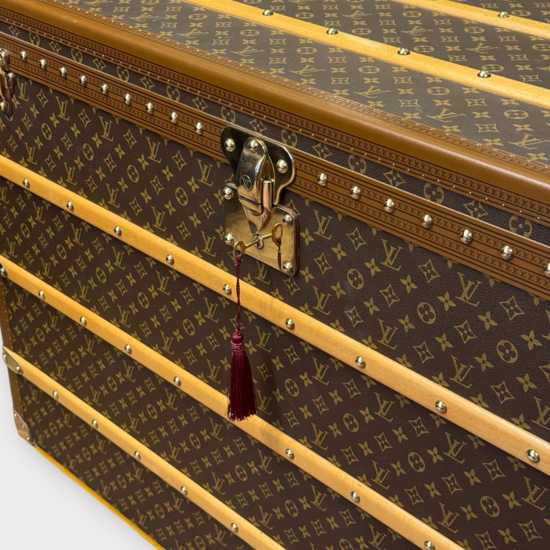 Louis Vuitton monogram trunk on a white background