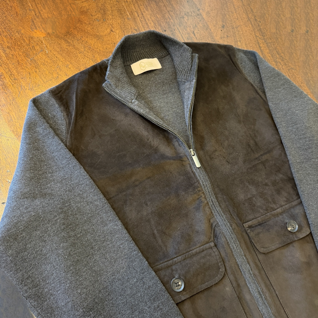 A Brown Suede front cardigan with Grey knitted arms and back in Italian merino
Wool. 