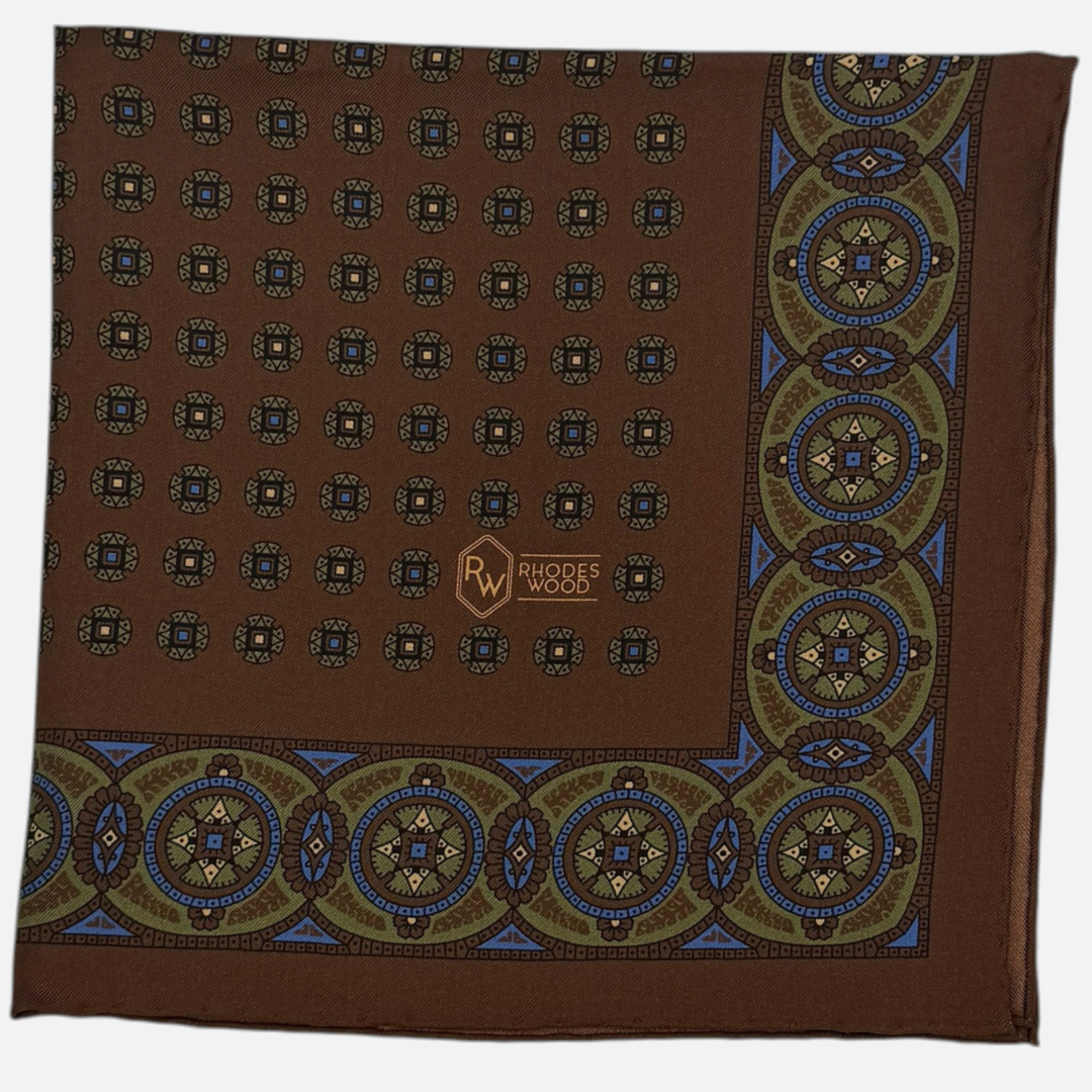 A brown medallion pocket Square. 