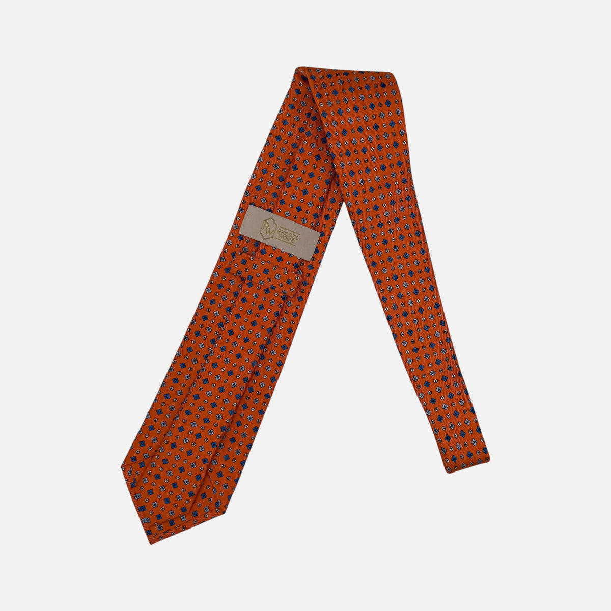 A Seville Orange necktie with medallions.