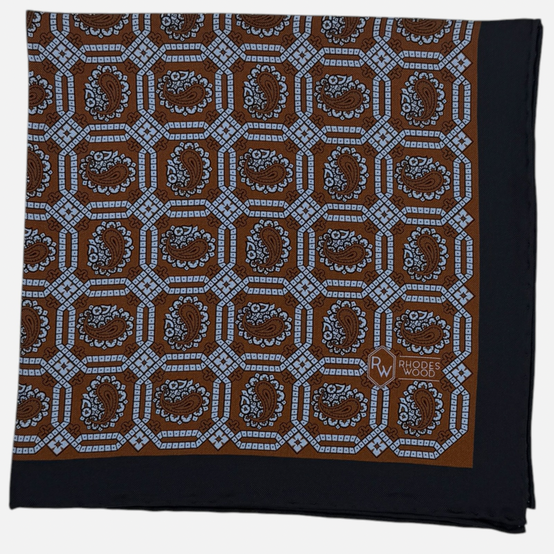 Brown & Sky Blue octagon Paisley pocket square with a navy border. 