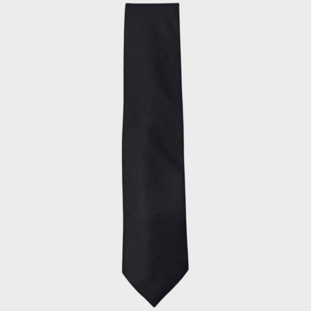 Navy blue tie on a light gray background