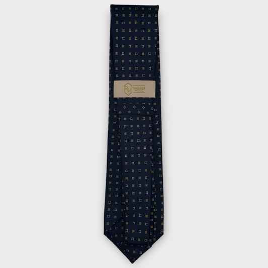 Classic silk necktie, printed in England, with a 9cm blade and 150cm length, laid flat against a plain background