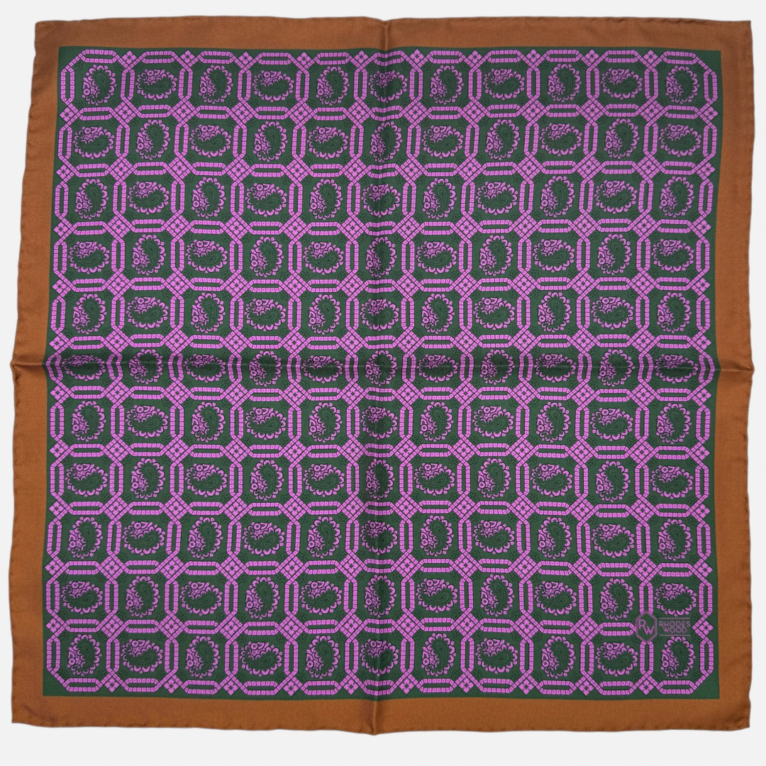 Green & pink octagon paisley repeating across the pocket square, with a brown boarder. 