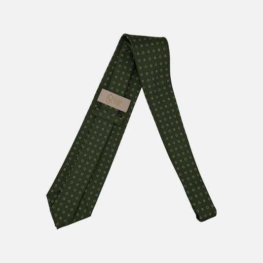 A bottle green necktie with small floral patterns. 