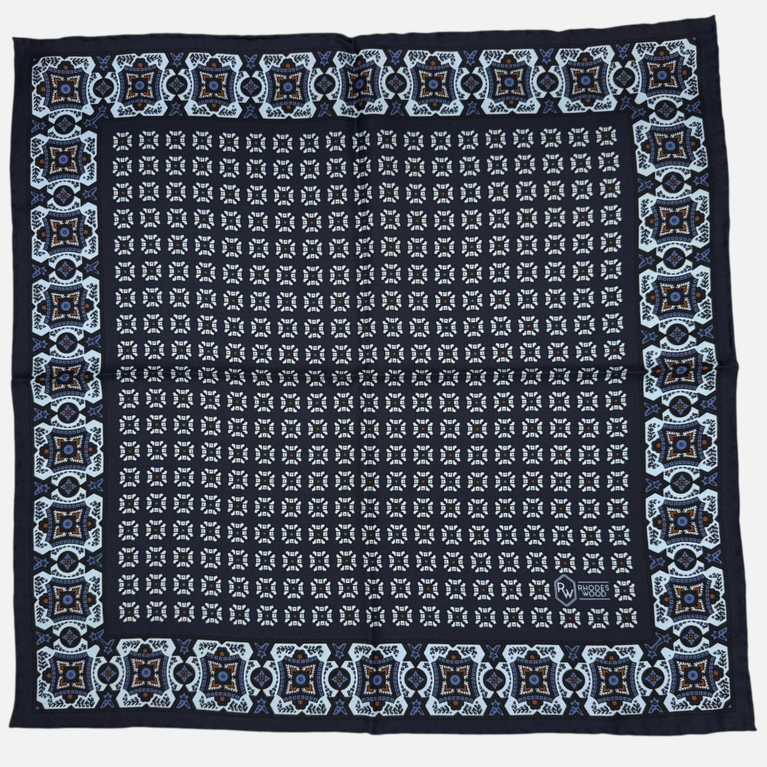 Navy Blue silk pocket square with sky blue
Mosaics repeating across the silk. 
