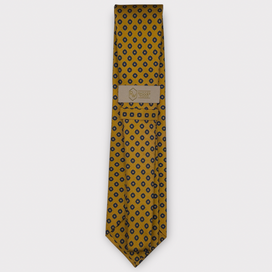 Classic silk necktie, printed in England, with a 9cm blade and 150cm length, laid flat against a plain background
