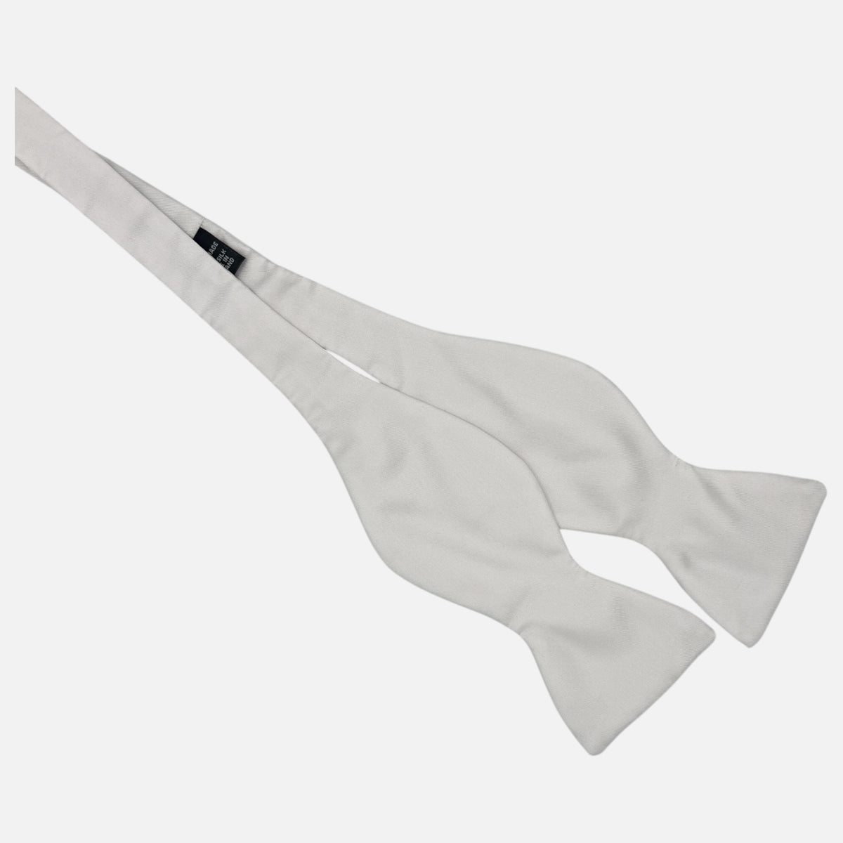A white silk self tie bow tie 