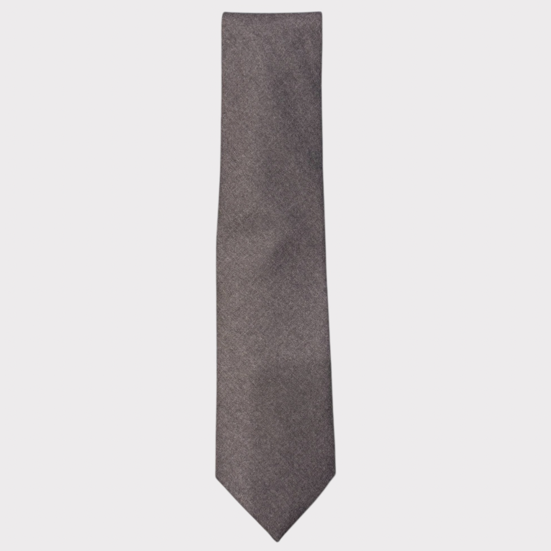 Gray tie on a light gray background