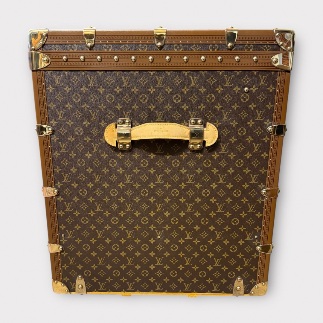 Louis Vuitton monogram trunk on a white background