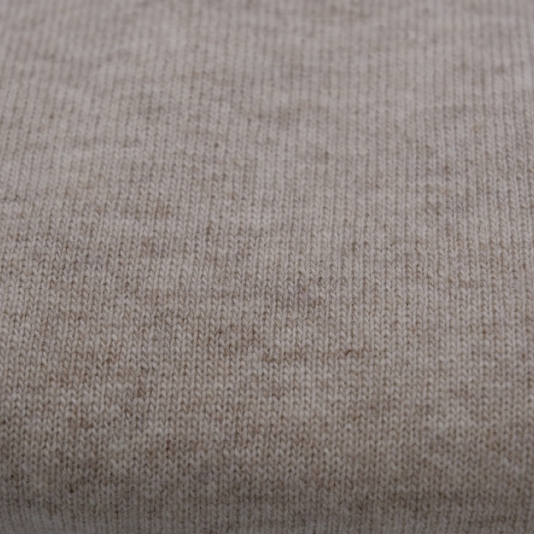 Close-up of cream fabric texture