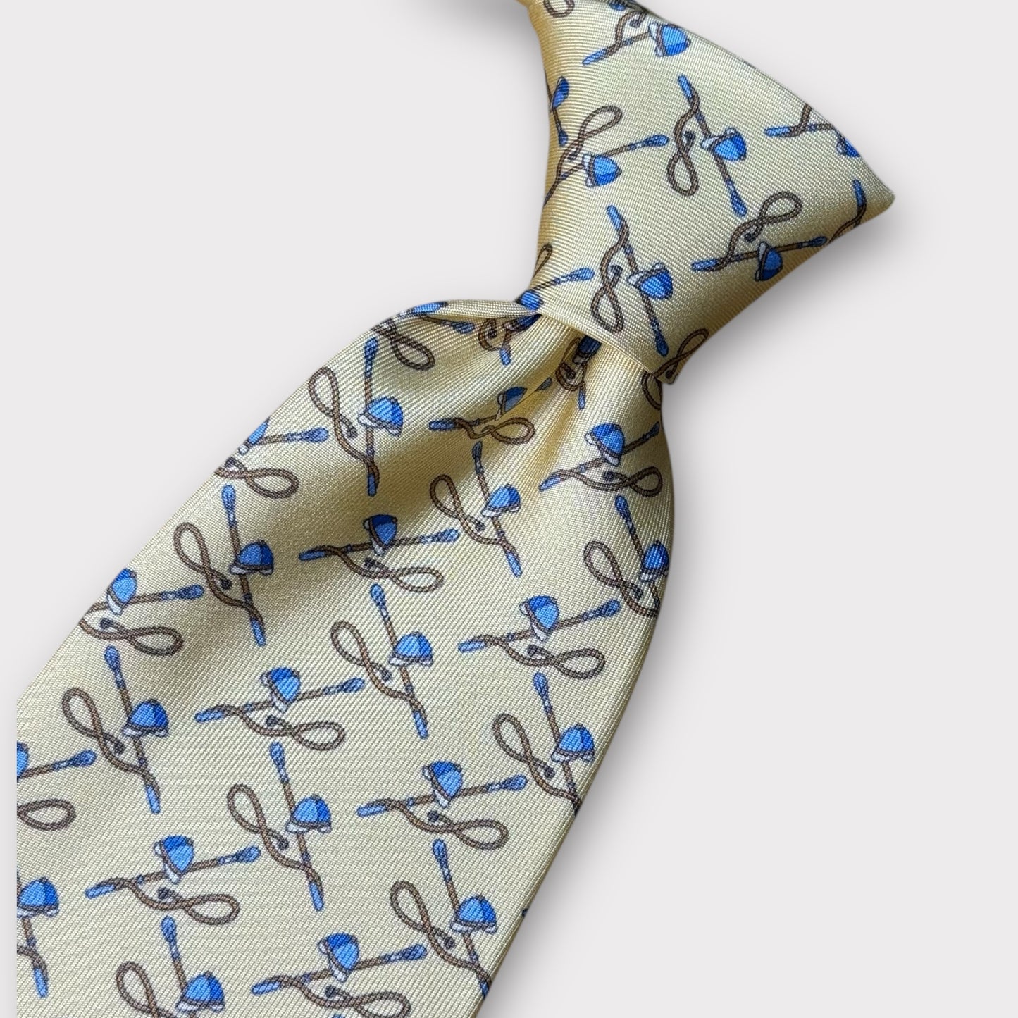 Yellow Horse crop and hat tie