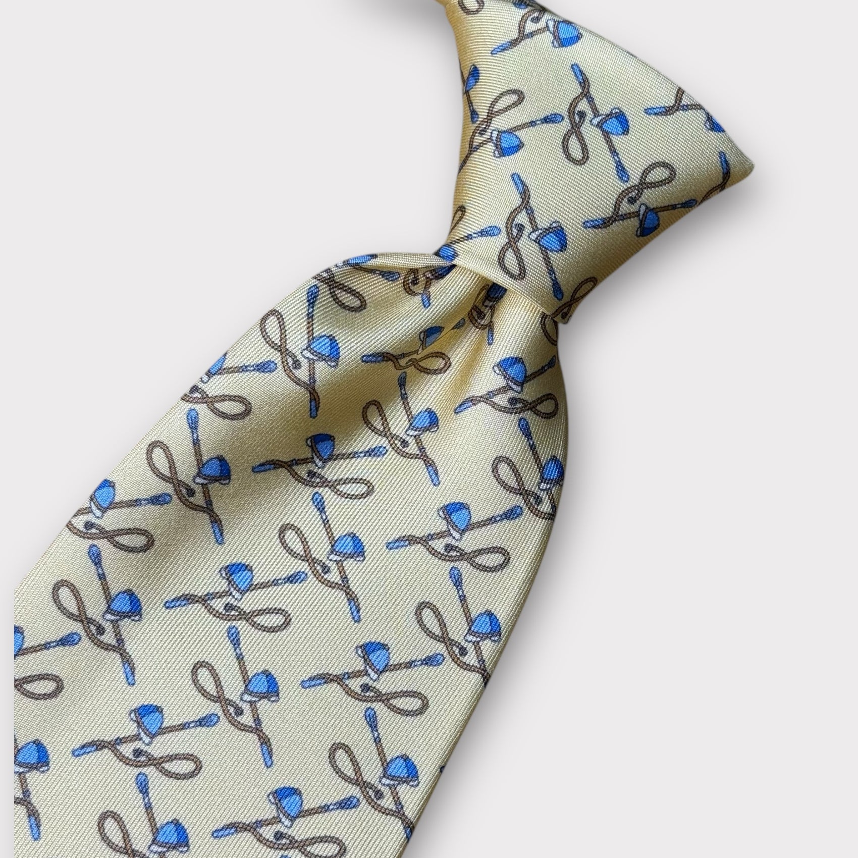 Yellow Horse crop and hat tie